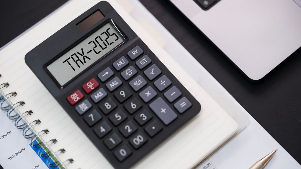 Calculator that has "Tax-2025" written on it